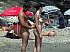 Nude Beach - Totally stripped cuties sunbathing naked.